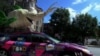 This car topped with a giant half-vegetable, half-fish, is part of a cross-country campaign to get more GMO labeling laws approved. 