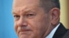 FILE -- German Chancellor Olaf Scholz attends his first annual summer news conference in Berlin, Germany, Aug. 11, 2022.