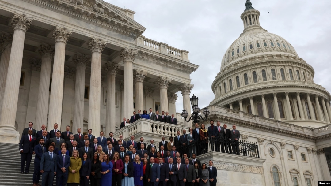 Members-elect from the U.S. House of Representatives pose for a group photo outside of the U.S. Capitol building in Washington, Nov. 15, 2022.