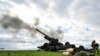 Ukrainian service members fire a shell from a towed howitzer FH-70 at a front line in the Zaporizhzhia Region, Ukraine Oct. 27, 2022.
