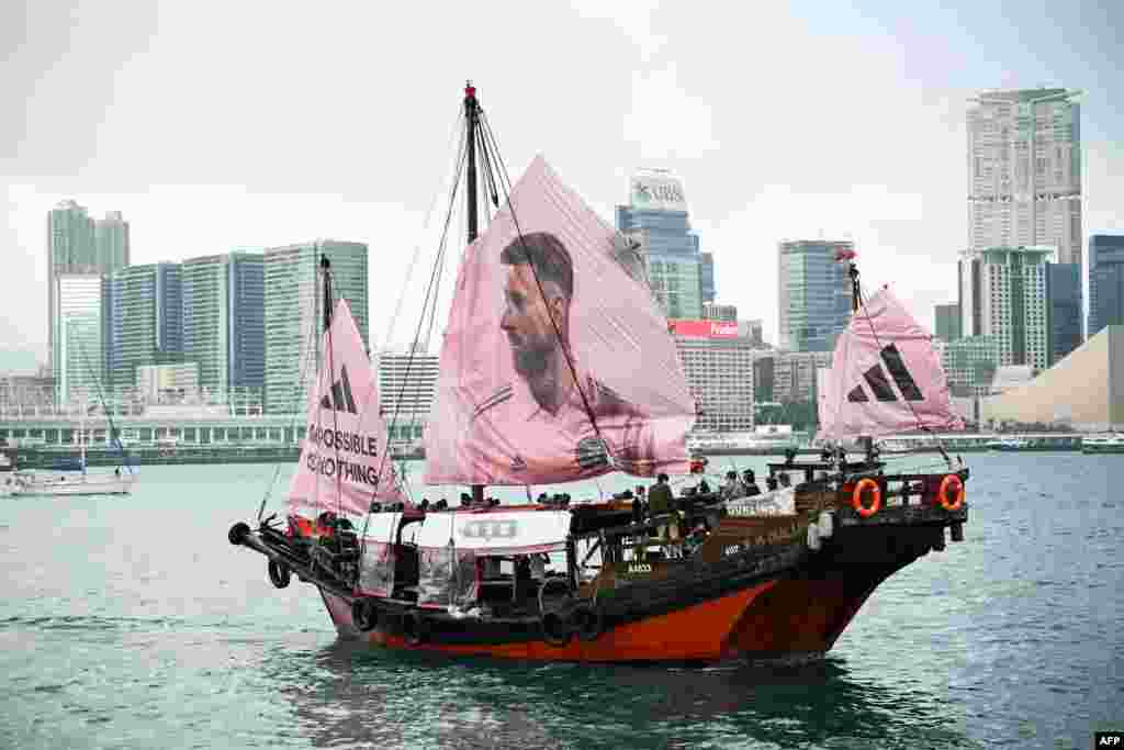 A junk with the face of Inter Miami CF Argentine forward Lionel Messi on its sail sails across Hong Kongs Victoria Harbor.