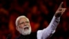 FILE - Indian Prime Minister Narendra Modi speaks at Qudos Bank Arena in Sydney, May 23, 2023. More than two dozen opposition parties have forged an alliance, called INDIA, to challenge Modi in 2024.