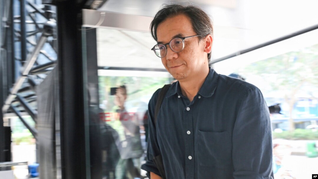 Chung Pui-kuen, the former editor-in-chief of Hong Kong's now-shuttered pro-democracy news outlet Stand News, arrives at the Wanchai District Court ahead of a verdict in a landmark sedition trial in Hong Kong on Aug. 29, 2024.