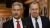Russia's Foreign Minister Sergey Lavrov, right, and India's Foreign Minister Subrahmanyam Jaishankar arrive for a joint press conference following their talks in Moscow, Dec. 27, 2023. 