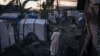 The imam of the mosque of the informal camp for displaced Muslims who fled attacks by the M23 rebels waits for nightfall to break the Ramadan fast in Goma, eastern Democratic Republic of Congo, March 27, 2023.