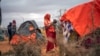 FILE - A Somali woman breastfeeds her child at a camp for displaced people on the outskirts of Dollow, Somalia, on Sept. 20, 2022. World Breastfeeding Week began Aug. 1, 2023.