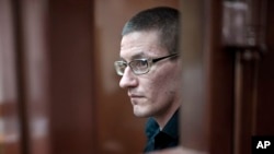 Robert Woodland, një shtetas amerikan i lindur në Rusi, gjatë gjykimit në një gjykatë të Moskës, më 4 korrik, 2024/AP 