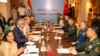 Indian Defense Minister Rajnath Singh, 3rd left, attends a meeting with his Chinese counterpart Li Shangfu, 3rd right, during the Shanghai Cooperation Organization Defense Minister's Meeting in New Delhi, April 27, 2023.