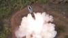 북한이 고체연료 기반의 신형 대륙간탄도미사일(ICBM) '화성포-18'형을 시험발사했다며 13일 사진을 공개했다.