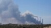 Smoke rises from an area near a power plant outside Ashkelon, Israel, Oct. 7, 2023. The U.N. Office for the Coordination of Humanitarian Affairs said Israeli authorities have ceased supplying electricity to the Gaza Strip.