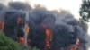 Incêndio violento na torre da Greater Nile Petroleum Oil Company em Cartum, capital do Sudão. 17 de setembro.