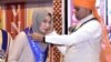 Razia Muradi receiving a gold medal for her accomplishments in a master's course in Public Administration at Veer Narmad South Gujarat University in India. (Photo courtesy Razia Muradi)
