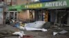 A view of blood on the ground at the scene after deadly Russian shelling that hit a bus station in Kherson, Ukraine, Feb. 21, 2023.