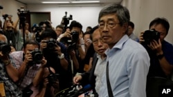FILE - Freed Hong Kong bookseller Lam Wing-kee is pictured at the outset of a news conference in Hong Kong, June 16, 2016. 