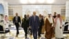 Turkish President Tayyip Erdogan walks alongside Mecca Governor Prince Khaled al-Faisal as he arrives at King Abdulaziz International Airport in Jeddah, Saudi Arabia, April 28, 2022.