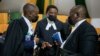 Kenyan Senior Counsel James Orengo, center, confers with lawyers Arnold Ochieng and Paul Mwangi during the ruling in the Building Bridges Initiatives case, at the Court of Appeal in Nairobi, Kenya, Aug. 20, 2021.