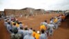 Kenyan prisoners watch a mock World Cup soccer match between Russia and Saudi Arabia, as part of a month-long soccer tournament involving eight prison teams at the Kamiti Maximum Prison, Kenya's largest prison facility, near Nairobi, Kenya, June 14, 2018.
