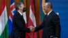 U.S. Secretary of State Antony Blinken and Turkish Foreign Minister Mevlut Cavusoglu meet at the Informal Meeting of NATO Ministers of Foreign Affair in Berlin, Germany, Sunday May 15, 2022.