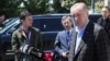 Turkish President Recep Tayyip Erdogan talks to media as he leaves a mosque after Friday prayers in Istanbul, Turkey, May 13, 2022.