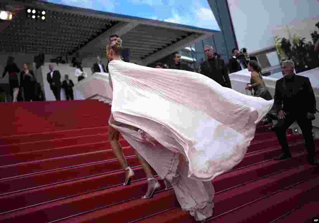 Natasha Poly poses for photographers upon arrival at the 75th anniversary celebration of the Cannes film festival and the premiere of the film 'The Innocent' at the 75th international film festival, Cannes, southern France.