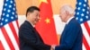 U.S. President Joe Biden, right, and Chinese President Xi Jinping shake hands before a meeting on the sidelines of the G-20 summit meeting, in Bali, Indonesia, Nov. 14, 2022.