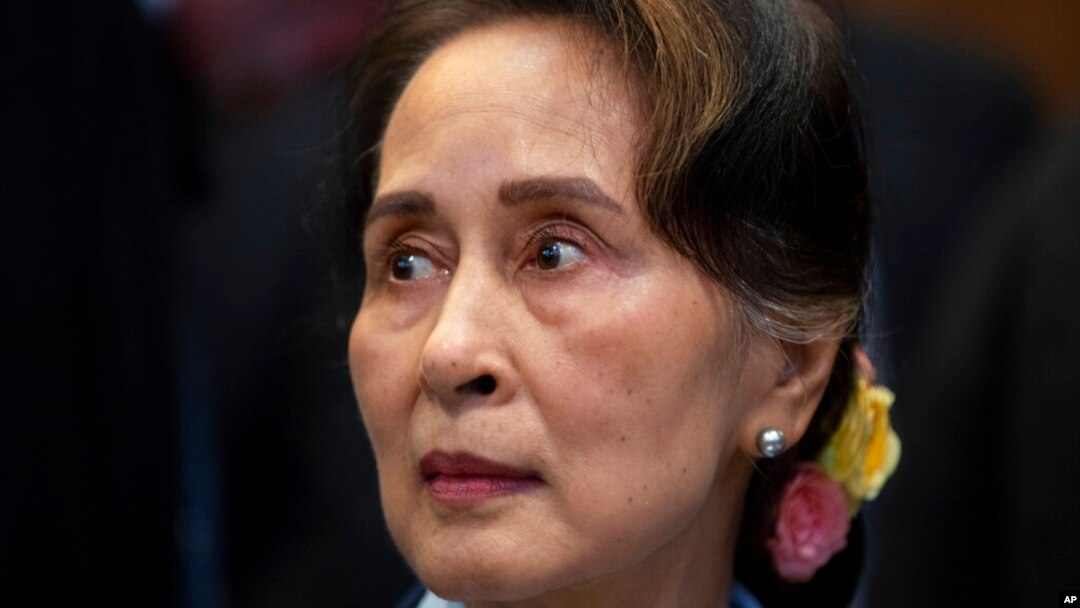 FILE - Then Myanmar's leader Aung San Suu Kyi waits to address judges of the International Court of Justice in The Hague, Netherlands, Dec. 11, 2019. 