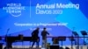 People set up the stage at the eve of the opening of the World Economic Forum in Davos, Switzerland, Jan. 15, 2023. 