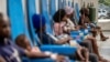FILE - Patients receive treatment for cholera at the Gheskio Center Hospital supported by UNICEF in Port-au-Prince, Haiti, Oct. 14, 2022.