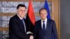 Libyan Prime Minister Fayez al-Sarraj poses with European Council President Donald Tusk in Brussels, Belgium, May 13, 2019. 