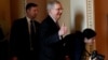 U.S. Senate Majority Leader Mitch McConnell (R-KY) gestures to reporters after lawmakers struck a deal to reopen the federal government three days into a shutdown on Capitol Hill in Washington, Jan. 22, 2018. 