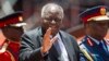 Former Kenyan President Mwai Kibaki arrives for the inauguration of his successor Uhuru Kenyatta, at Kasarani, near Nairobi, Kenya, April 9, 2013. Kibaki has died at the age of 90, President Uhuru Kenyatta announced Friday.