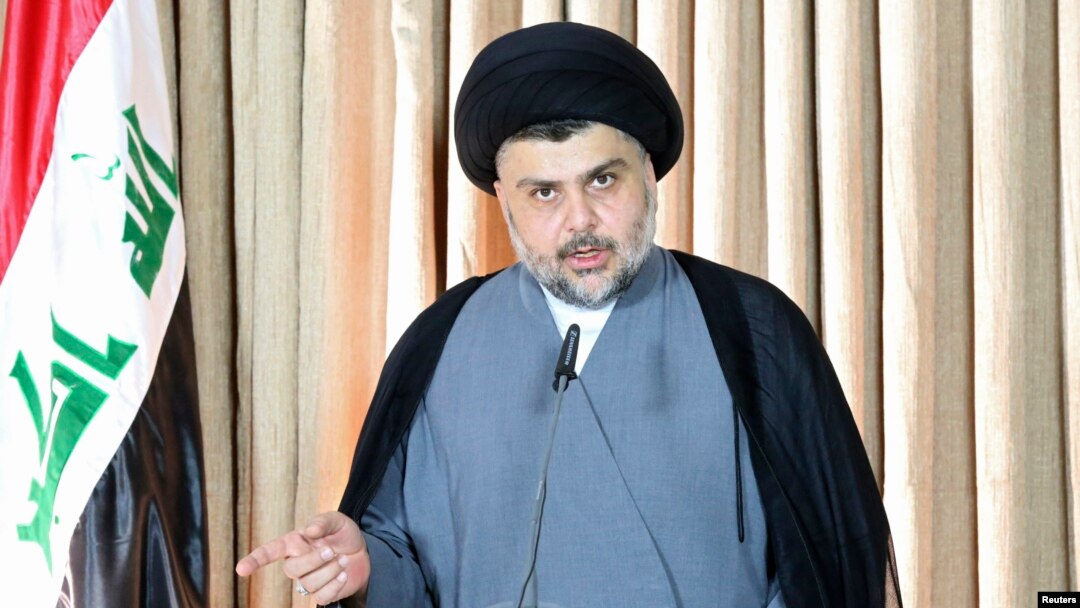 FILE - Iraq's Shi'ite religious cleric Moqtada al-Sadr gives a speech in Najaf, June 25, 2014. Sadr condemned the kidnapping of 18 Turkish workers in Baghdad and said he was ready to assist the government in securing their release.