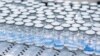 FILE - This August 2022 photo provided by Pfizer shows vials of the company's updated COVID-19 vaccine during production in Kalamazoo, Mich. 
