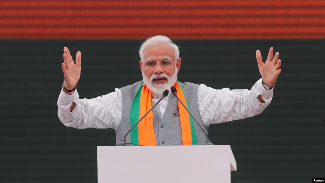 FILE - Indian Prime Minister Narendra Modi gestures as he speaks after releasing India's ruling Bharatiya Janata Party (BJP)'s election manifesto for the April/May general election, in New Delhi, April 8, 2019. 