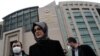 Hatice Cengiz, fiancee of the murdered Saudi journalist Jamal Khashoggi, leaves Justice Palace, the Caglayan Courthouse, after attending a trial on the killing of Khashoggi at the Saudi Arabian Consulate, in Istanbul, Turkey, Apr. 7, 2022. 