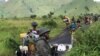 Residentes evacuados de uma zona atacada pelo M23, no Congo