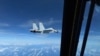 中國海軍一架殲11戰機2022年12月21日在國際空域極為危險地攔截美國的一架偵察機。