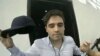 FILE - This Oct. 17, 2019 frame grab from video provided by the Mexican government shows Ovidio Guzman Lopez at the moment of his detention, in Culiacan, Mexico. 