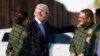 FILE - President Joe Biden talks with U.S. Border Patrol agents as they stand along a stretch of the U.S.-Mexico border in El Paso Texas, Jan. 8, 2023. 