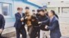 한국 통일부가 지난 12일 공개한 2019년 11월 탈북어민 2명 판문점 송환 당시 장면. (자료사진=한국 통일부)