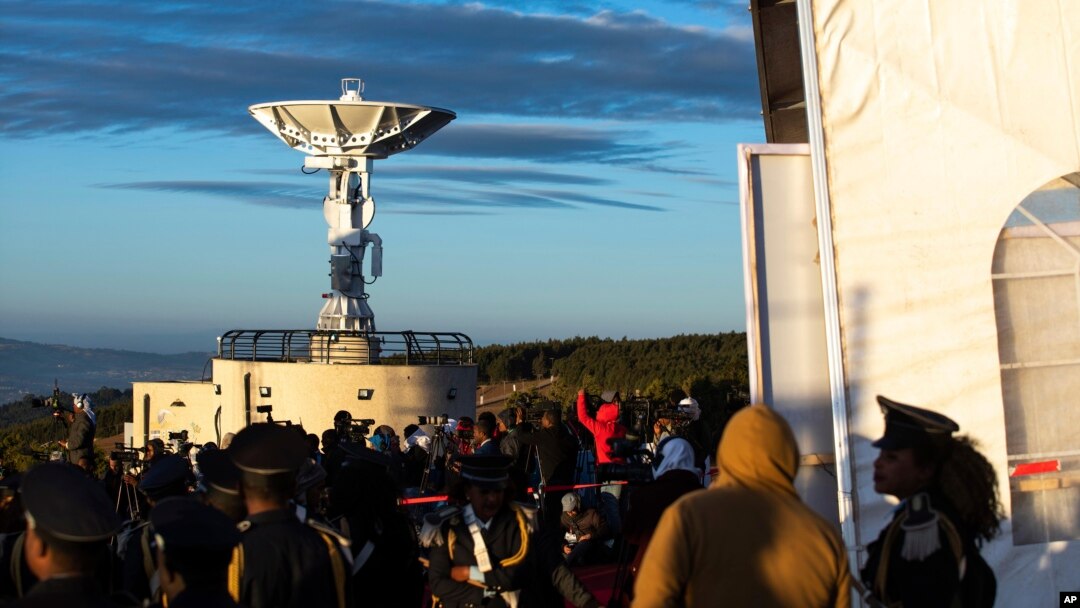 FILE - People attend the launch of Ethiopia's first micro-satellite (ETRSS-1) at the Entoto Observatory on the outskirts of the capital Addis Ababa, Dec. 20, 2019. Ethiopia's first-ever satellite has been launched into space by China.