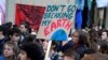 Youths demonstrate for climate change during the "Fridays for Future" school strike, in front of the Ecology Ministry in Paris, France, Feb. 15, 2019. 