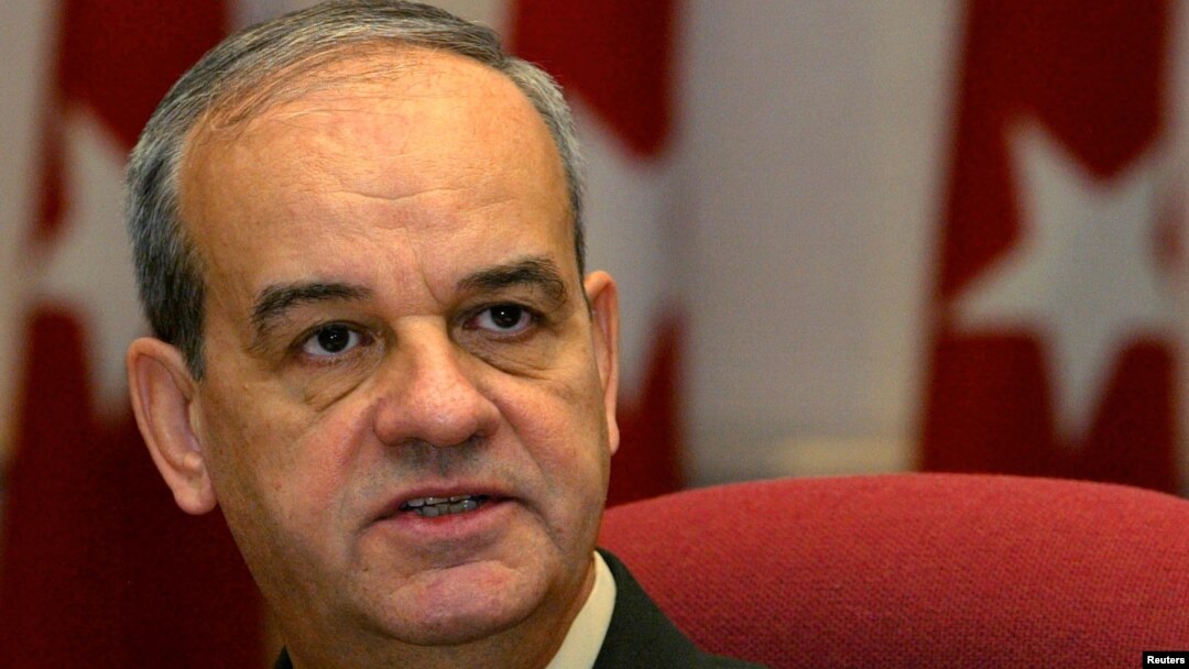 General Ilker Basbug addresses the media in Ankara, Oct. 13, 2013. 