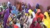 Women and children rescued from their Boko Haram captors are seen in Meri, Cameroon, April 9, 2021. (Moki Edwin Kindzeka/VOA)