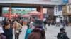 The central shopping district in Yanji City has many signs in Korean, China, Apirl 4, 2013. (B. Ide/VOA)