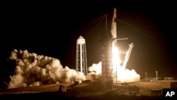 A SpaceX Falcon 9 rocket with a demo Crew Dragon spacecraft lifts off for a test flight to the International Space Station from Cape Canaveral, Fla., March 2, 2019. Aboard is one passenger: a life-size test dummy, names Ripley, after the lead character in the "Alien" movies.
