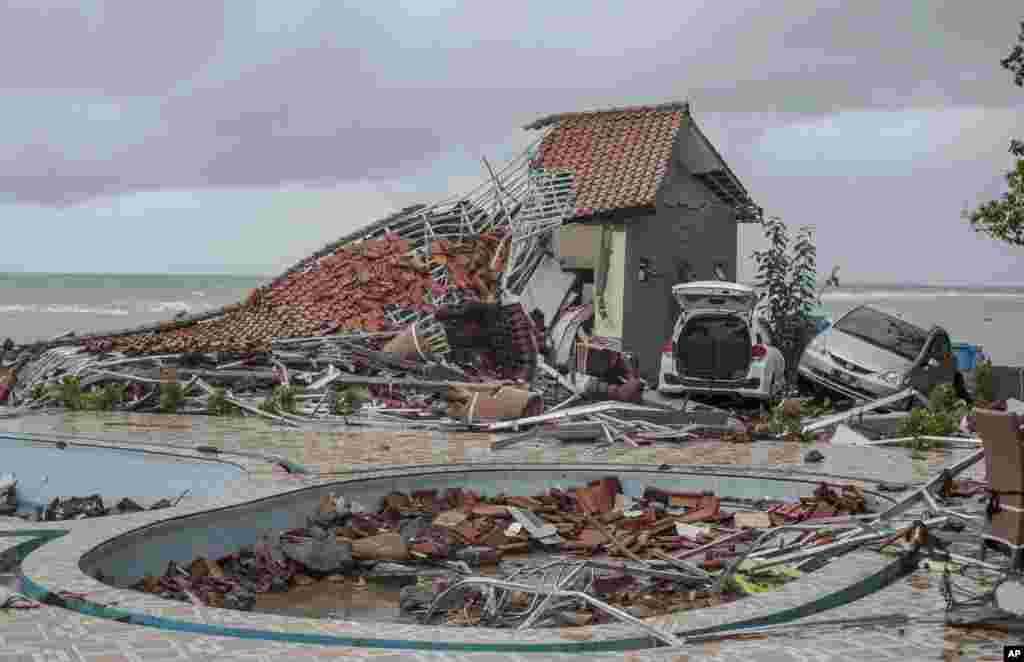 Debris littered a property badly damaged by a tsunami in Carita, Indonesia. The tsunami struck after the eruption of a volcano around Sunda Strait during a busy holiday weekend, killing more than 200 people, sweeping away hotels, hundreds of houses and people attending a beach concert.