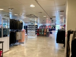 An empty women's clothing section at the remaining Tati store in Paris. (Lisa Bryant/VOA)