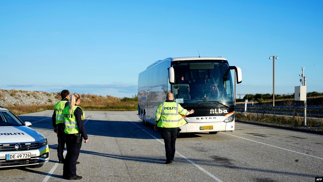 FILE - Copenhagen police stop a bus during a patrol at the border with Sweden on October 5, 2024. The Swedish intelligence agency Sapo said on October 3 that Iran may have been involved in explosions and gunfire around Israeli embassies in Sweden and Denmark.