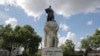 Graffiti reading "down with the official version" is seen on the base of the statue of French military commander Joseph Gallieni, outside the Invalides monument, June 16, 2020 in Paris.